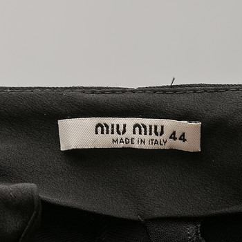 бирка Брюки Miu Miu