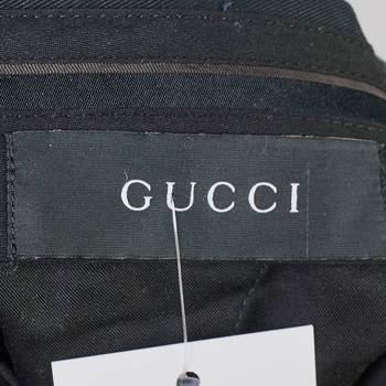 бирка Брюки Gucci