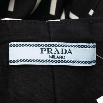 бирка Брюки Prada