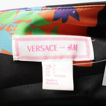 бирка Платье H&M x Versace