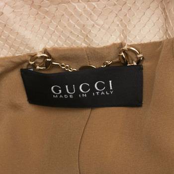 бирка Кожаная куртка Gucci