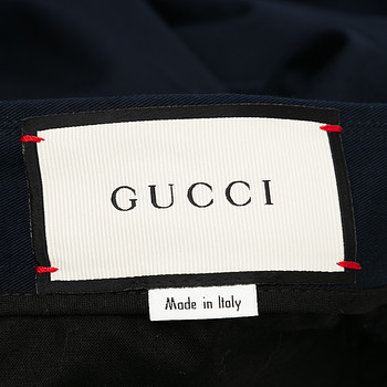 бирка Брюки Gucci