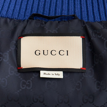 бирка Пуховик Gucci