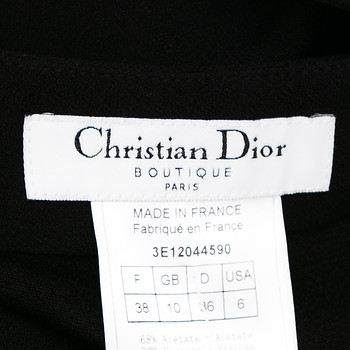 бирка Брюки Christian Dior