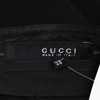 бирка Брюки Gucci