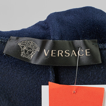 бирка Брюки Versace