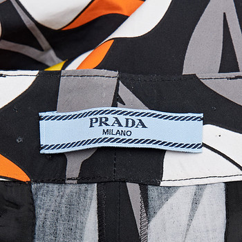 бирка Брюки Prada