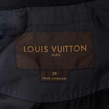 бирка Плащ Louis Vuitton