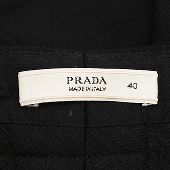 бирка Брюки Prada
