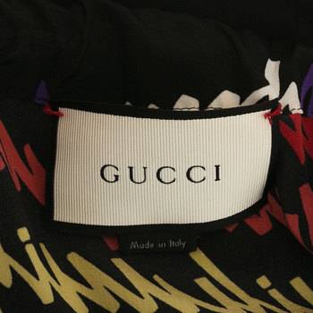 бирка Брюки Gucci