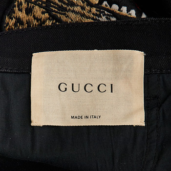 бирка Джинсы Gucci