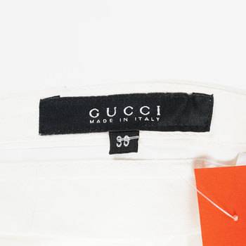 бирка Брюки Gucci