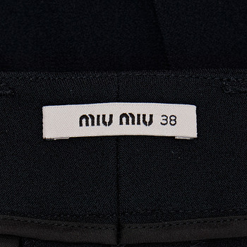 бирка Брюки Miu Miu