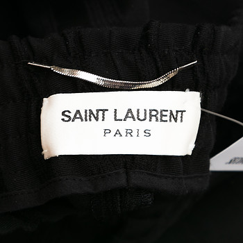 бирка Брюки Saint Laurent