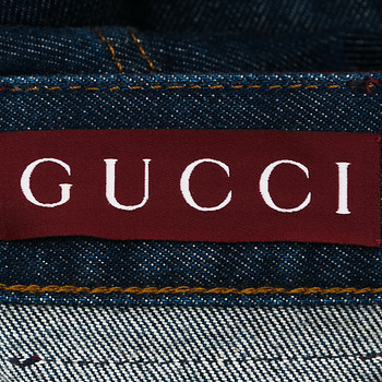 бирка Джинсы Gucci