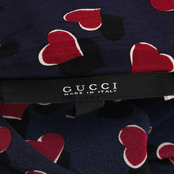 бирка Комбинезон Gucci