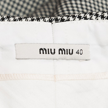 бирка Брюки Miu Miu
