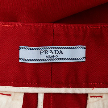 бирка Брюки Prada