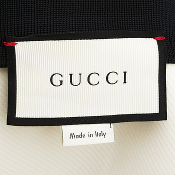 бирка Легкая куртка Gucci