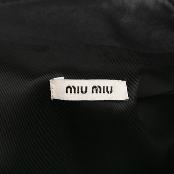 бирка Плащ Miu Miu