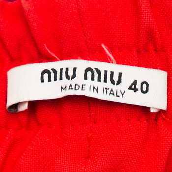 бирка Брюки Miu Miu
