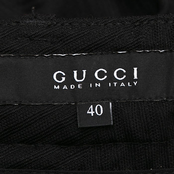 бирка Брюки Gucci