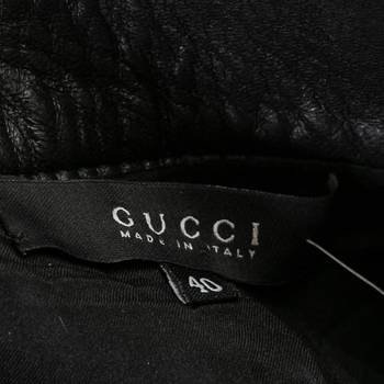 бирка Кожаные брюки Gucci