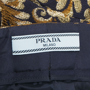 бирка Брюки Prada