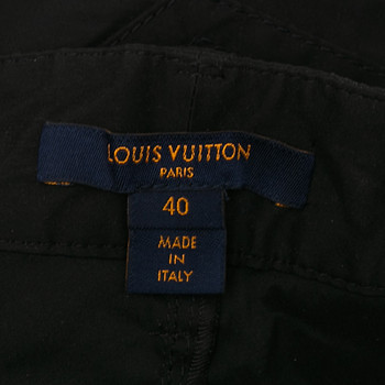 бирка Брюки Louis Vuitton