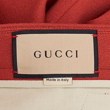 бирка Брюки Gucci