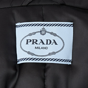 бирка Пуховик Prada