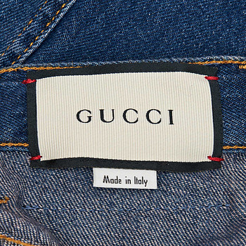 бирка Джинсы Gucci