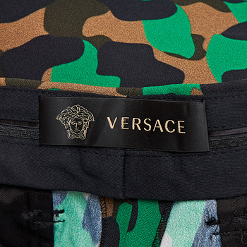 бирка Брюки Versace