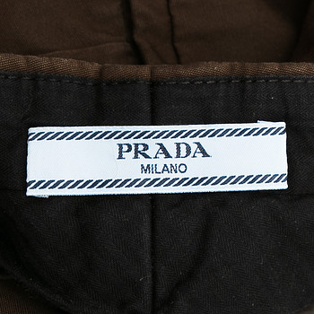 бирка Брюки Prada