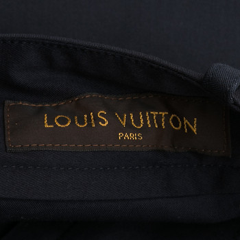 бирка Брюки Louis Vuitton