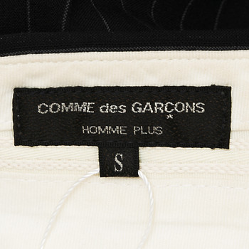 бирка Брюки Comme des Garcons