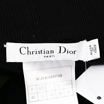 бирка Брюки Christian Dior