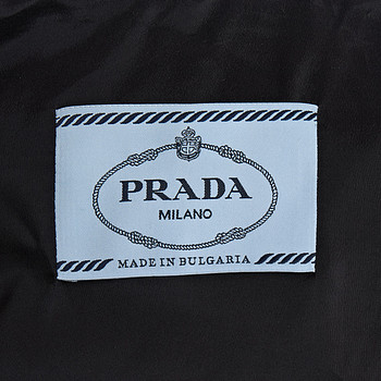 бирка Пуховик Prada