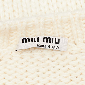 бирка Свитер Miu Miu