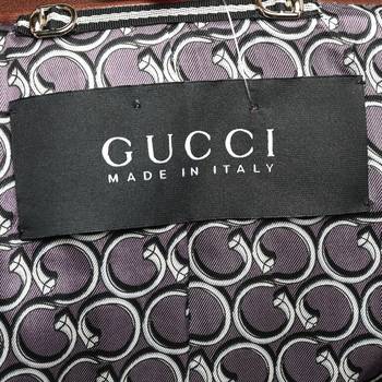бирка Кожаное пальто Gucci