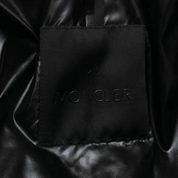 бирка Пуховик Moncler