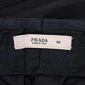 бирка Брюки Prada