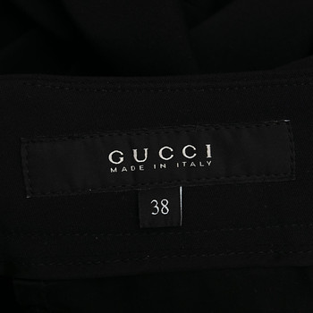 бирка Брюки Gucci