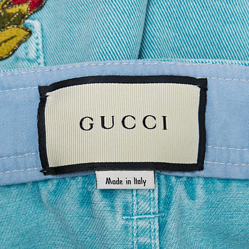 бирка Джинсы Gucci