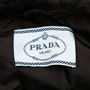 бирка Пуховик Prada