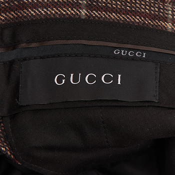 бирка Брюки Gucci