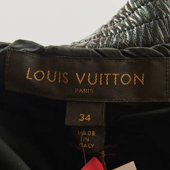 бирка Кожаные брюки Louis Vuitton