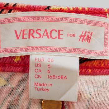 бирка Джинсы H&M х Versace