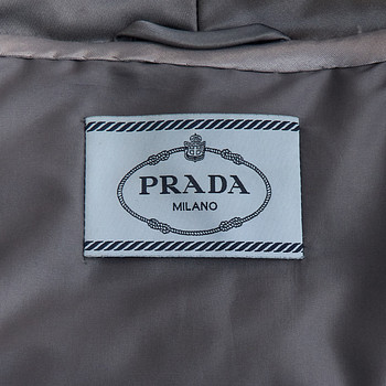 бирка Пуховик Prada