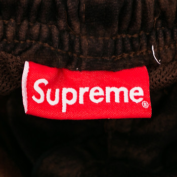 бирка Брюки Supreme
